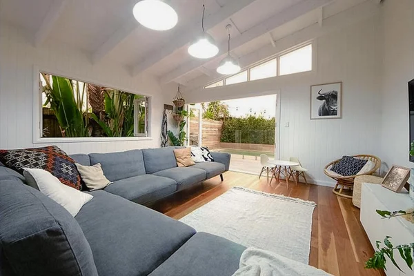 Beach house renovation - Poolside entertainment deck and landscaping detail