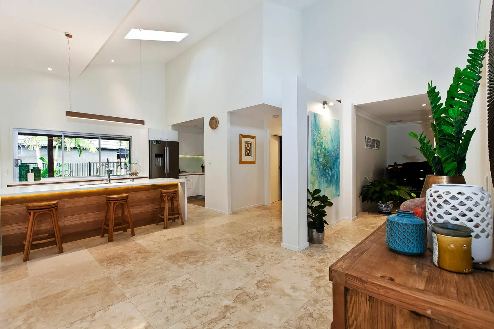 Apex House Renovation in Burleigh Heads - Transformed living area with coastal views