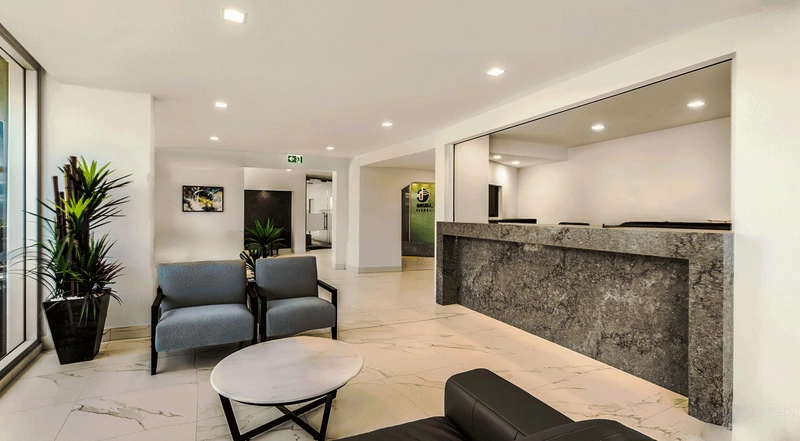 Queensland coastal architecture showcasing modern sustainable design with natural materials and climate-responsive features
