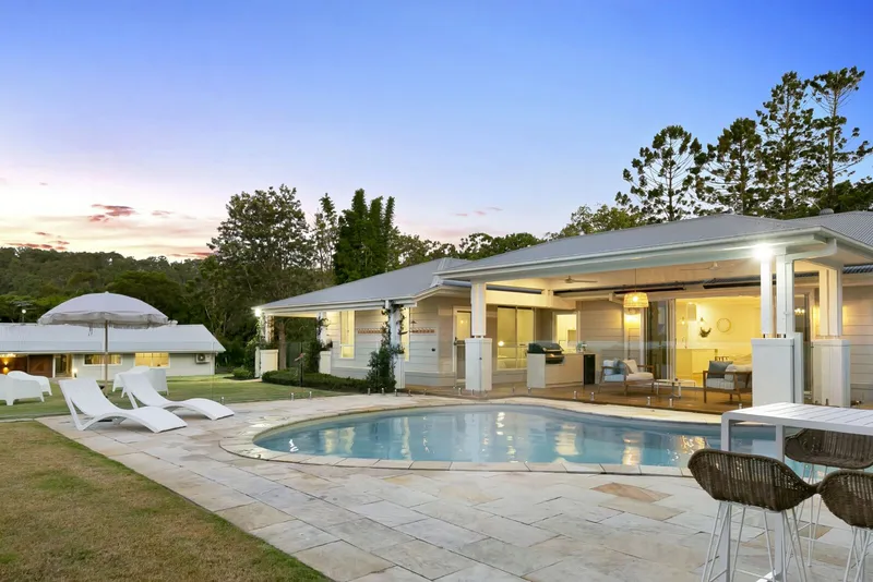 Tallebudgera Homestead - Modern alfresco pavilion at rear showing seamless indoor-outdoor living integration