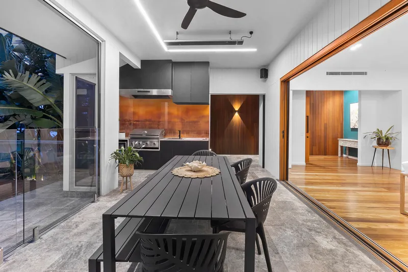 The Causeway House - Modern kitchen with concrete island and timber warmth