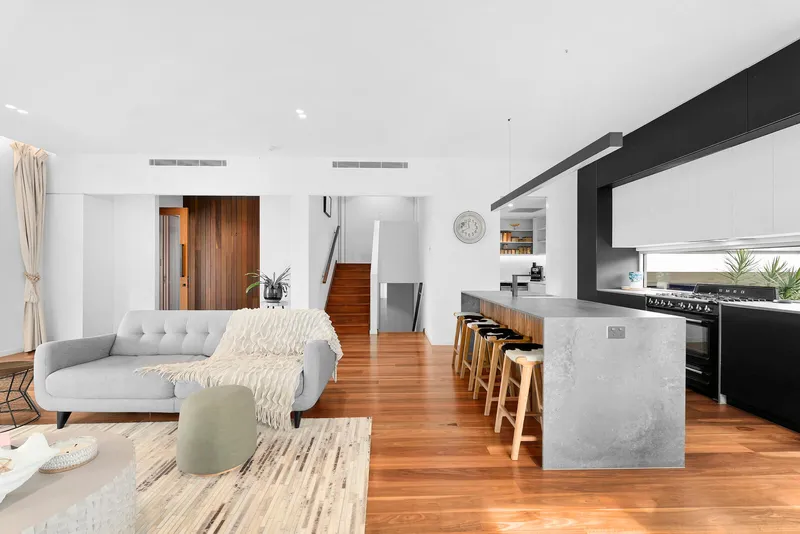 The Causeway House - Bedroom interior with natural light and coastal views