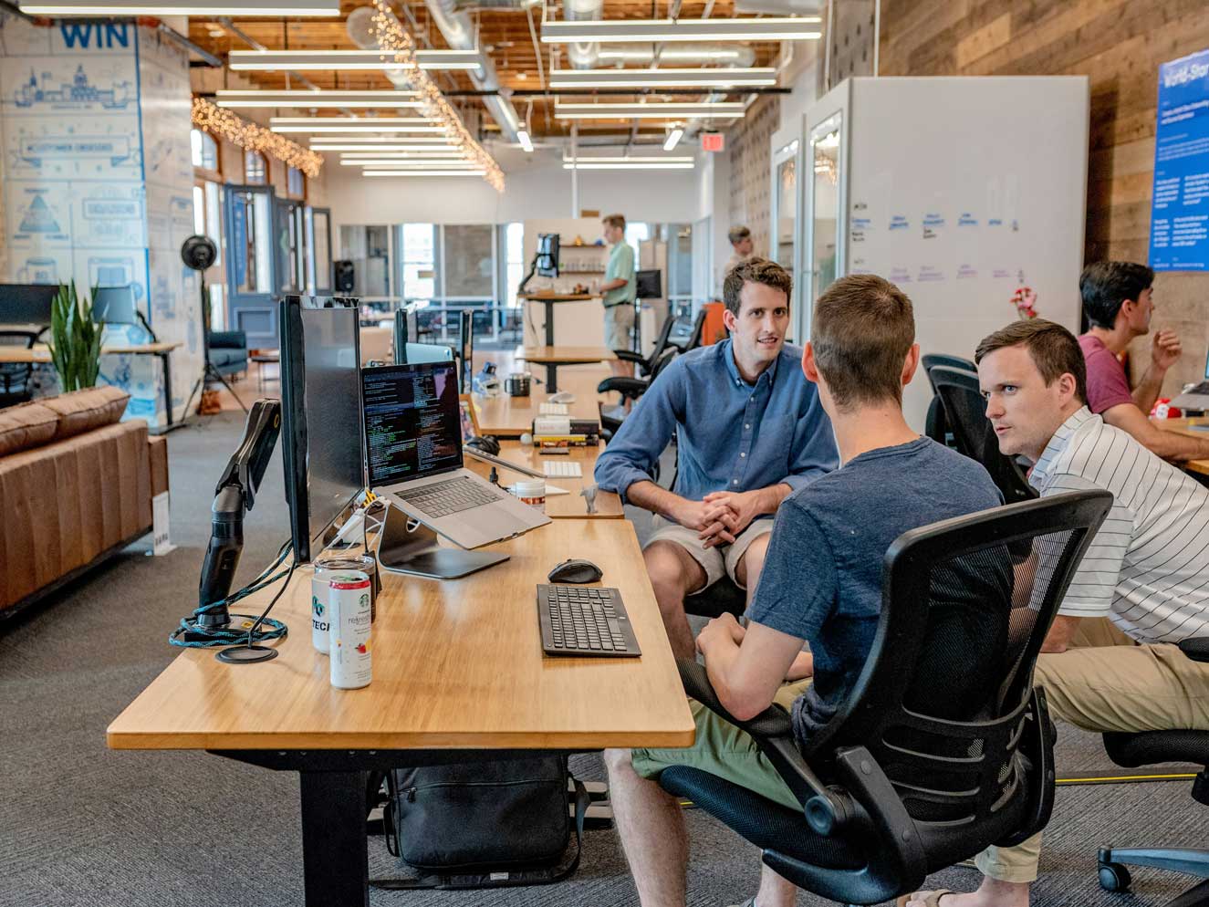 Professional meeting taking place in modern conference room